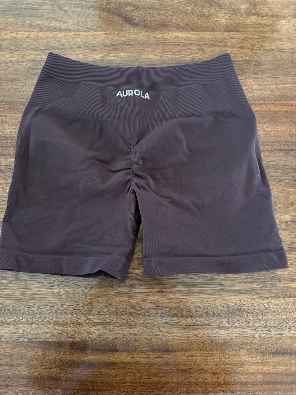 Aurola High-Waist Ruched Bike Shorts in Dark Brown
